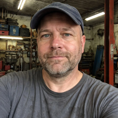 Man with baseball cap on